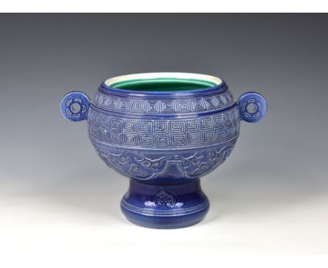 A Chinese porcelain Republic style twin handled vase, possibly of the period, of compressed globular form, with twin pierced 