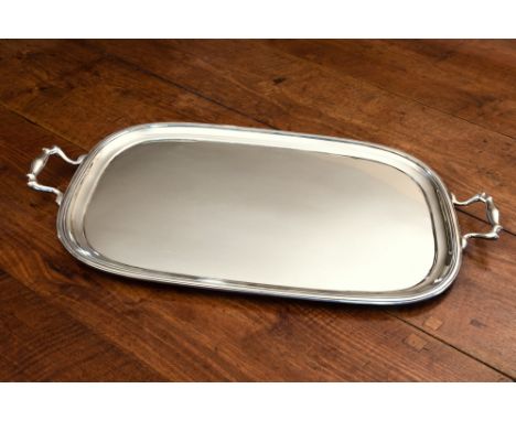 A George V silver oval twin handled tray, William Hutton & Sons Ltd, Sheffield, 1918, of large proportions, measuring 28¾in. 