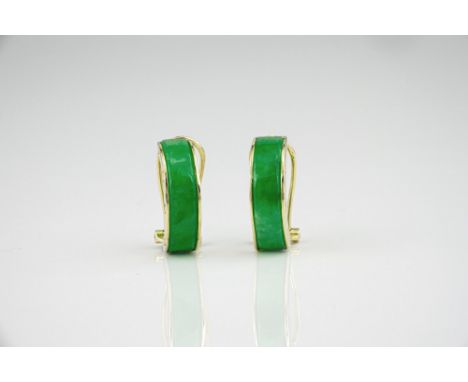 A pair of 14ct yellow gold and green jade hoop earrings, the hoops with Cartier style screw-head decoration to the sides, 12m