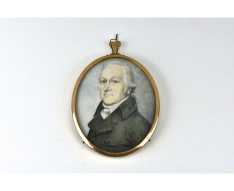 English School - first half 19th century, Portrait of a gentleman, oval watercolour on ivory, wearing a black double breasted