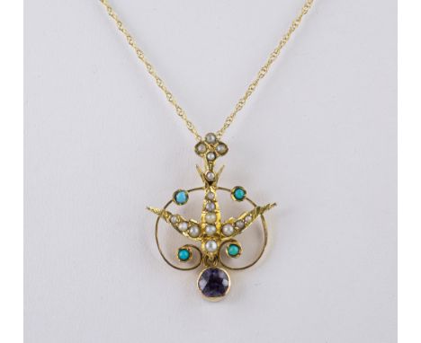 A Victorian 9ct gold, amethyst, turquoise and seed pearl pendant, in the Art Nouveau taste, in the form of a bird within a sc