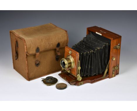 A Victorian mahogany and brass-bound plate camera, c.1895, by J. Lancaster &amp; Son, Birmingham, complete with shutter, canv