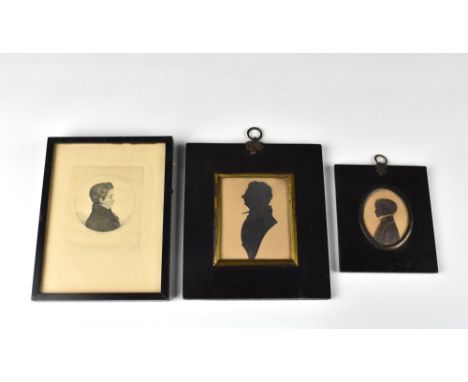 Ellis family interest - an early 19th century portrait silhouette of a boy, oval, enriched with gilt, inscribed verso 'Walter