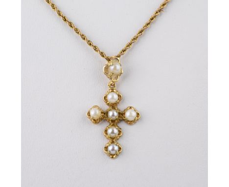 An 18ct yellow gold and seed pearl cross pendant, on 9ct yellow gold chain.