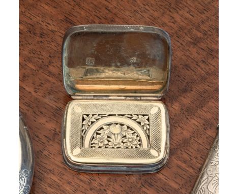 A George III silver vinaigrette, Thomas Phipps & Edward Robinson, London, 1805, of canted - rectangular form, decorated with 