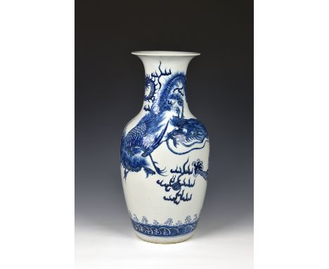 A Chinese porcelain blue and white baluster dragon vase, probably 19th century, painted with a five toed dragon and a phoenix