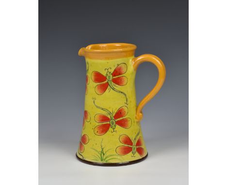 A Keif German Art Pottery jug / pitcher, decorated with dragonflies on yellow ground, impressed signature to base, 8¼in. (21c
