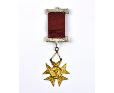 A late Victorian 9ct gold shooting medal - Military interest, hallmarked, Birmingham, 1889, of star shaped form, the obverse 