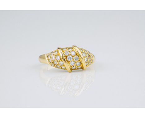 An 18ct yellow gold and diamond ring, the bombé setting pavé set with brilliant cut diamonds, size J½.