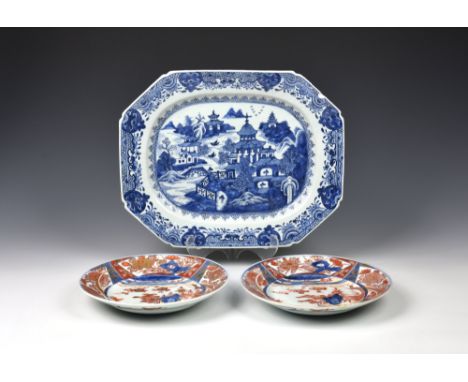 A Chinese porcelain blue and white platter, late 18th century, with clipped corners, 14½in. (36.8cm.) long, rim chip; togethe