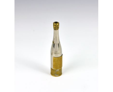 A novelty champagne bottle propelling pencil and lighter combination, the pull off base opening to reveal the lighter and wel