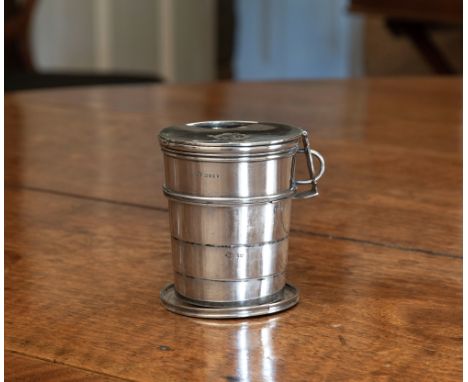 A Victorian silver collapsible hunting cup, Thomas Johnson I, London, 1876, the four section cup with hinged lock down cover 