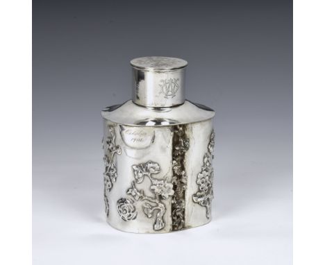 A Chinese silver tea caddy, maker Gem Wo, 19th century, of oval form with applied branches of blossoming prunus in relief, ce