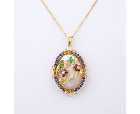 An 18ct yellow gold, emerald, ruby, sapphire, diamond and Mabé pearl pendant, the large oval pearl beneath two gem-set rose b