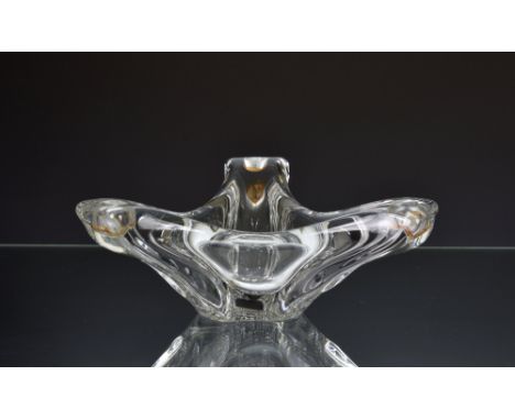 A Daum France clear glass three stick candle holder float boat centrepiece, the tri-form shaped centrepiece, signed towards t