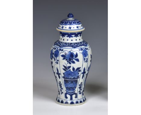 A Chinese blue and white porcelain baluster vase and cover from the Vung Tau cargo, the base painted with an artemesia leaf, 