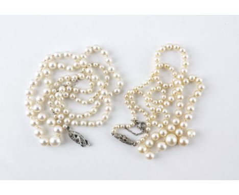 Two vintage graduated cultured pearl necklaces, 1930s-50s, single strand, one with 18ct white gold and diamond clasp, the oth