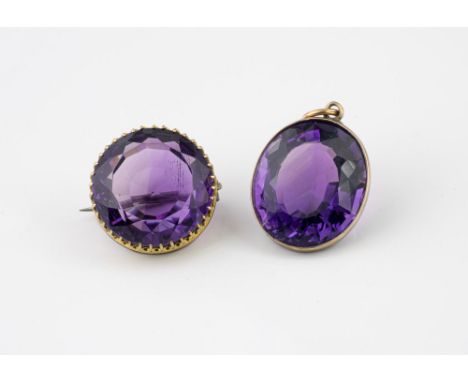 A Victorian amethyst pendant, the 20 x 17.5mm. oval cut stone set in gilt metal; together with an amethyst and gilt metal bro