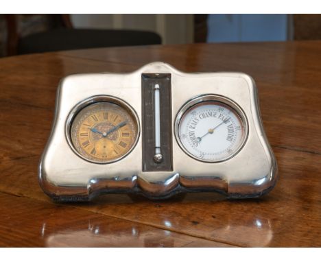 An Edwardian silver mounted desk clock and barometer, Matthew John Jessop, London 1902, the shaped case with easel back and c