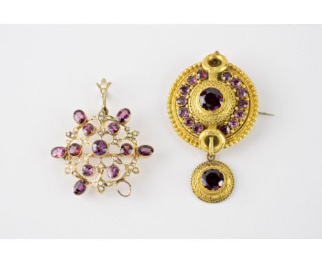 A Victorian 15ct gold and amethyst drop brooch, in the archaeological revival style, the shield shaped brooch set with a roun