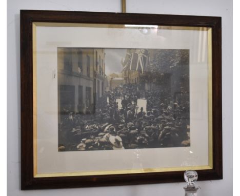 A framed photograph of King George V, Queen Mary and Princess Mary's carriage outside The Royal Courts, during the visit to G