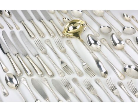 An extensive Channel Islands silver flatware service by Bruce Russell, Guernsey, c.1986, twelve place setting, of beaded thre