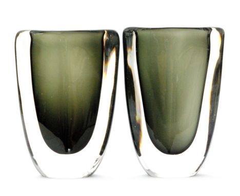 A pair of large Orrefors glass Dusk vases by Nils Landberg, of compressed tapering form, the deep olive core heavily cased in