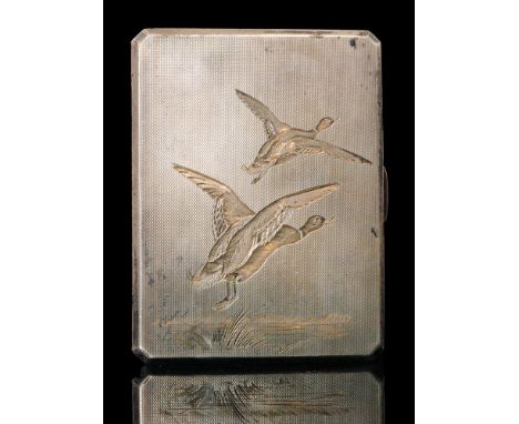 A hallmarked silver rectangular cigarette case engraved with two mallards in flight to an engine turned ground, weight 5.8oz,