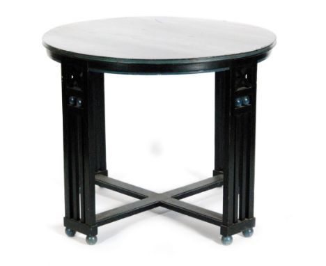 A pair of early 20th Century Arts and Crafts Heals circular centre tables in an overall black and blue painted finish, each r