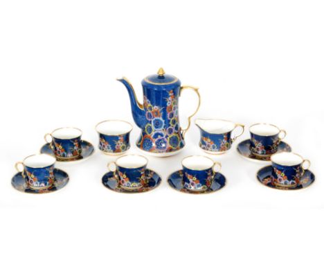 A 1920s Carlton China coffee service decorated in the Garden 4880 pattern comprising coffee pot, six cups and saucers, sugar 