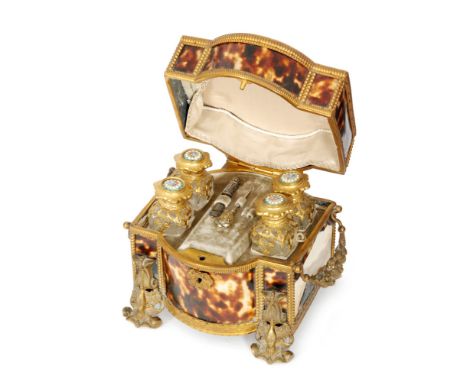 A late 19th Century Palais Royale ormolu mounted tortoiseshell combined scent and needlework casket, hinged silk lined lid wi