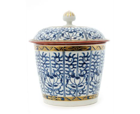 A late 18th to early 19th Century Worcester Royal Lily pattern sugar box and cover decorated with panels of stylised flowers 