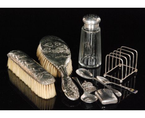 Nine assorted items of hallmarked silver to include two hair brushes, toast rack, vesta case, sugar castor and flatware, vari