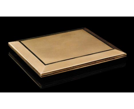 A hallmarked 9ct rectangular cigarette case with bevelled edges and engine turned decoration, slide action opening mechanism 
