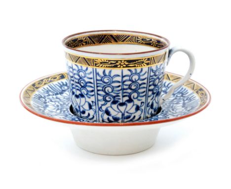 A late 18th to early 19th Century Worcester Royal Lily pattern trembleuse decorated with floral panels and a gilt border trim