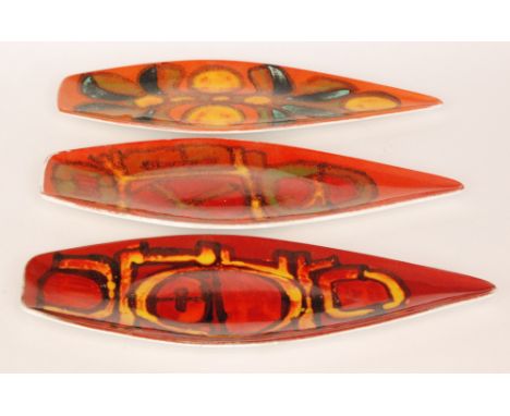 Three Poole Pottery shape 82 Delphis spear dishes decorated in the typical manner with abstract patterns, two by Carol Cutler