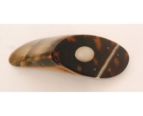 A 19th Century horn and tortoise shell snuff box, the shaped horn base below silver mounted tortoise shell, length 7.5cm. 