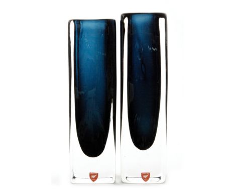 A pair of post war Orrefors Dusk glass vase by Nils Landberg, of square sleeve form, the internal deep blue core heavily case