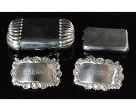 A hallmarked silver cigarette case with fluted decoration and gilt interior, Birmingham 1893, a match case holder with engine