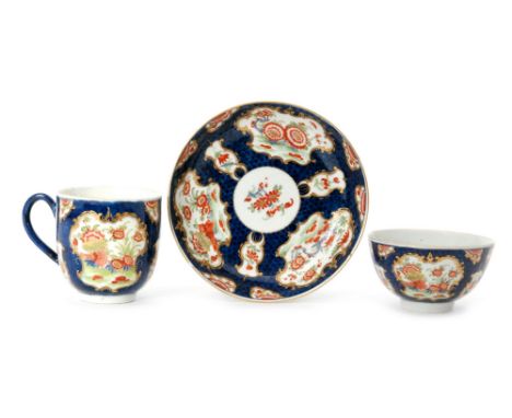 An 18th Century Worcester trio comprising tea bowl, coffee cup and saucer decorated in the Rich Kakiemon pattern with floral 