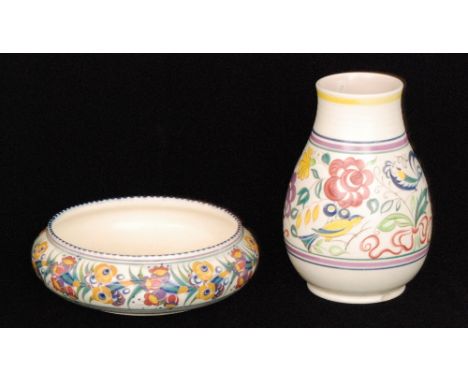 Two pieces of Poole Pottery comprising a shape 492 large shallow bowl decorated in the EE pattern by Marian Heath with fuschi