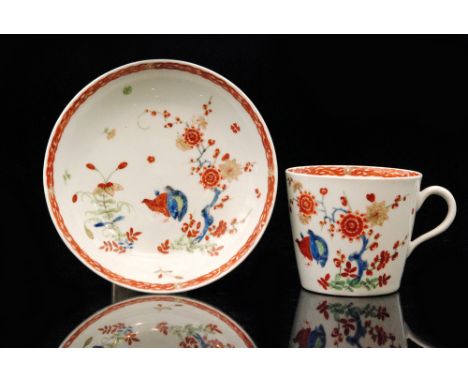 A late 18th Century Worcester coffee cup and saucer decorated in the Kakiemon palette Two Quail pattern, the two plump birds 