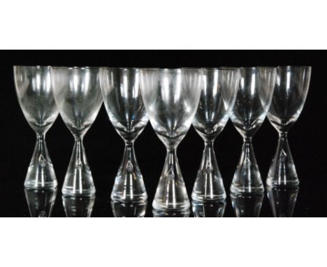 A set of seven post war Holmegaard Princess wine glasses by Bent Severin, the conical foot with and internal air tear rising 