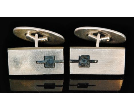 A pair of Danish silver swivel cufflinks, rectangular head with a cut matt finish, Nils From. 