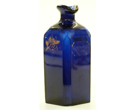 A 19th century Bristol blue glass 'Rum' decanter with faceted edges and gilt decoration, possible Isaac Jacobs 18cm tall.