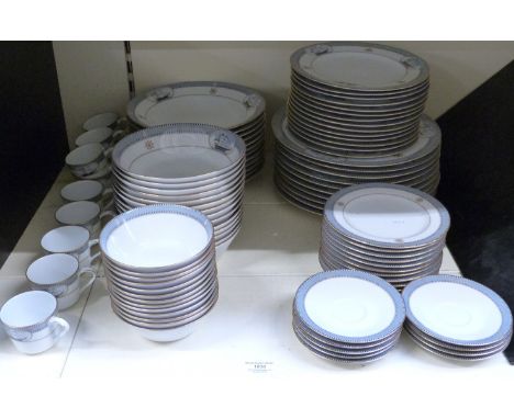 Noritake dinner and tea set decorated in the High Seas pattern, eight place settings with extras, approximately 93 pieces