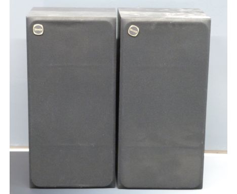 A pair of Tannoy stereo speakers No. 966700 in black woodgrain finish with wall bracket fittings&nbsp;