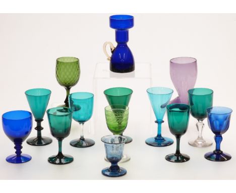 Fourteen coloured glass drinking glasses inclusing amethyst, Bristol blue etc, one in the form of a boot, largest 13.5cm tall