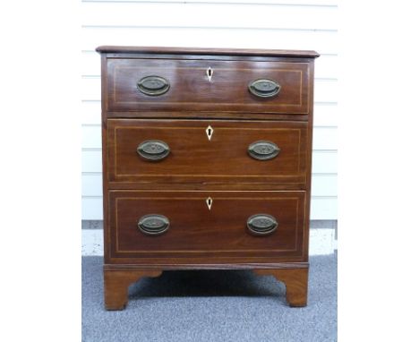 19th century inlaid mahogany bachelor's chest of three straight graduated drawers with ivory escutcheons raised on bracket fe