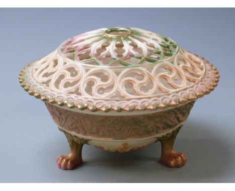 Royal Worcester relief moulded blush ivory pot pourri raised on three lion pad feet, shape no 846, diameter 22cm